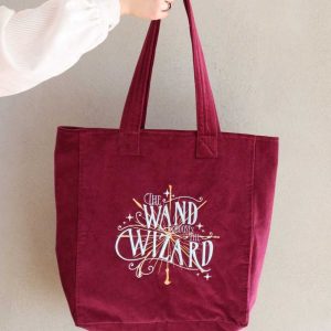 tote bag en velours brodé la baguette choisit son sorcier the carat shop